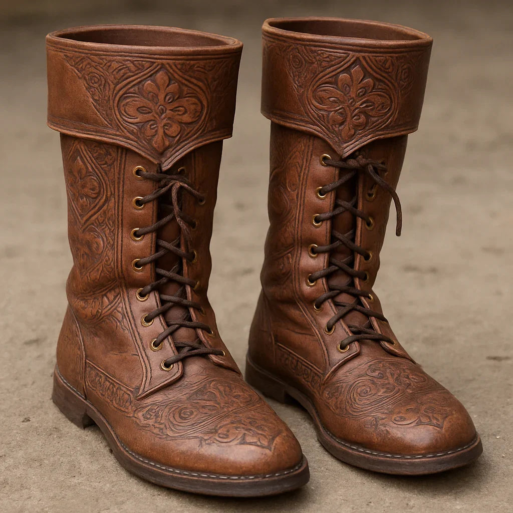 Handmade medieval leather boots with intricate floral tooling, wrap laces, and full-grain texture for LARP or SCA reenactment.