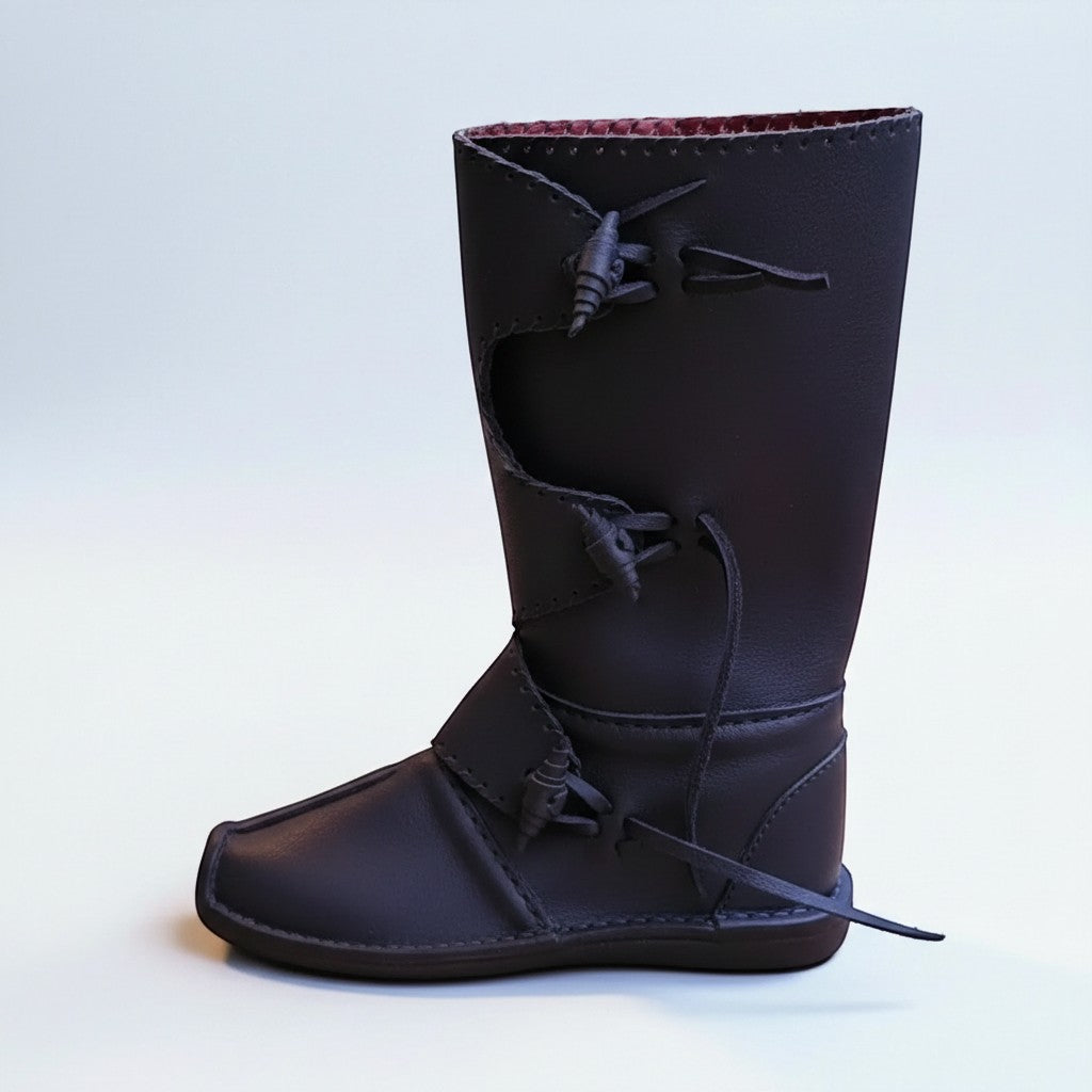 Black handmade medieval leather boot with wrap laces, visible stitching, and full-grain leather texture, ideal for LARP or SCA reenactment.